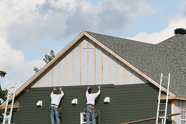 Professional Storm Damage Siding Repair technician working in Crofton, MD